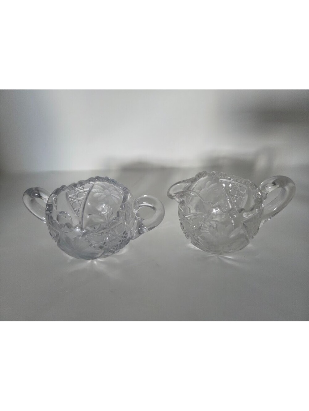 Clear Cut Glass Creamer and Sugar Set with Scalloped Rims and Starburst Motif